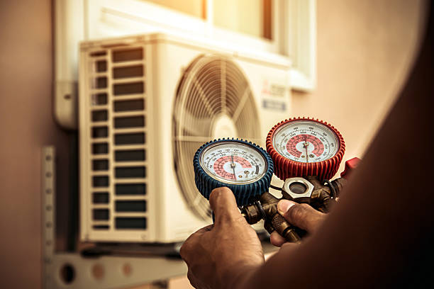 Professional Heat Pump Repair technician working in Martinsville, IL